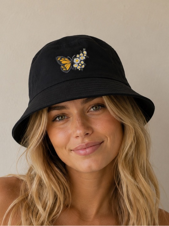 Urban Outfitters Accessories - Urban Outfitters Black Bucket Hat with Yellow Butterfly and White Daisies